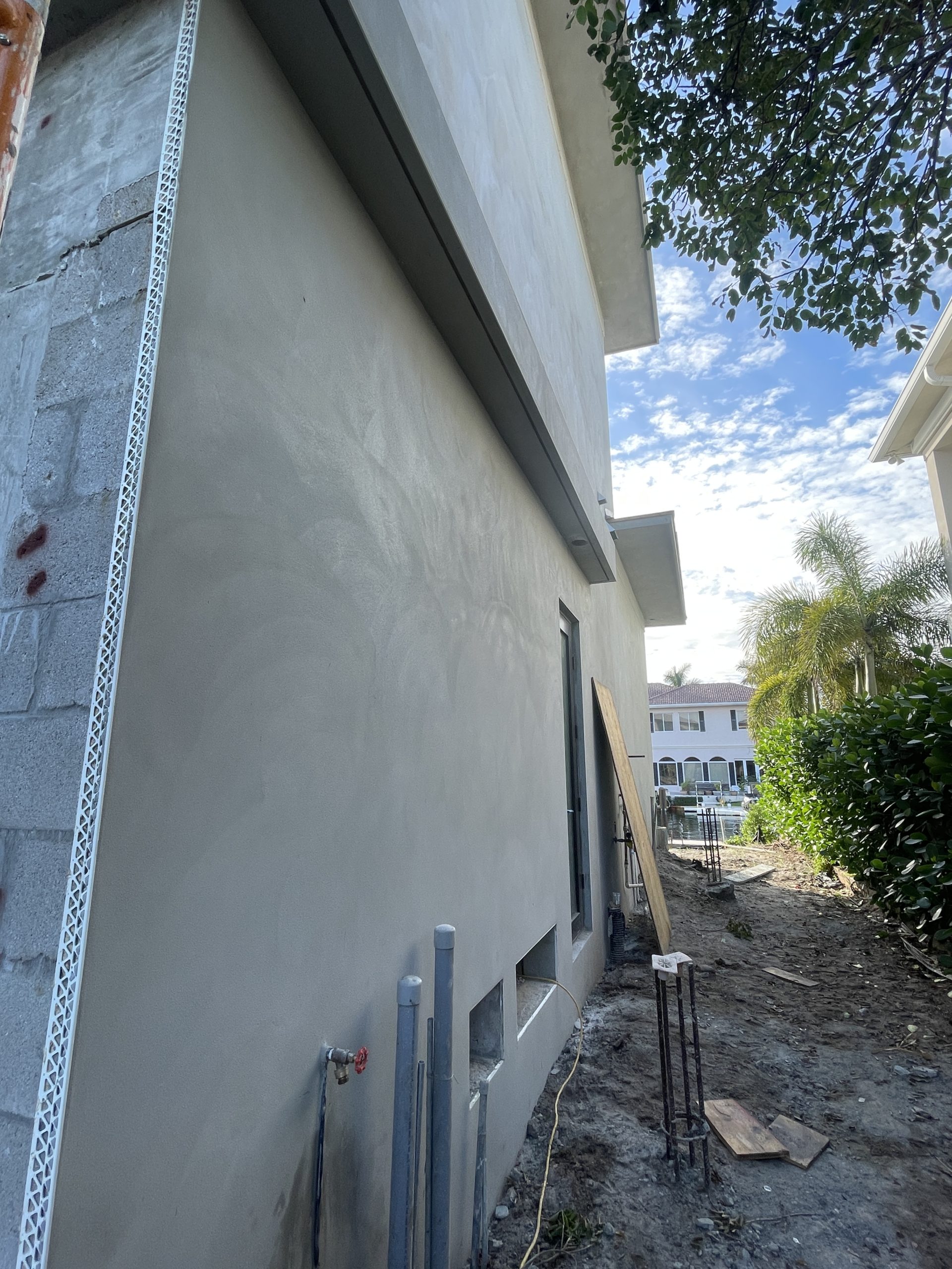 Ultra-smooth sand finish stucco applied by Rayo Stucco Services, providing a flawless and elegant exterior for luxury homes and commercial properties in Florida.